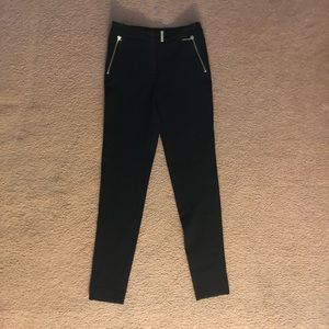 Black pants with gold zipper